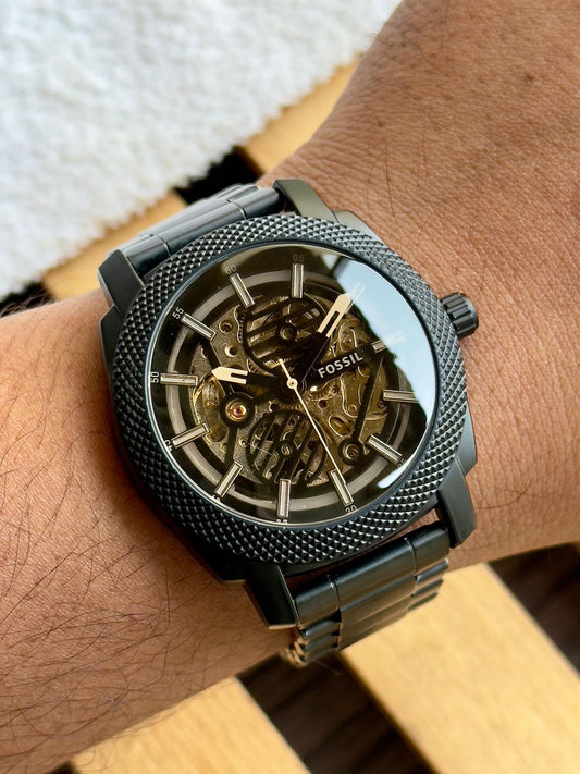 _A stunning blend of industrial elegance and mechanical artistry, this Fossil watch is pure wrist perfection._